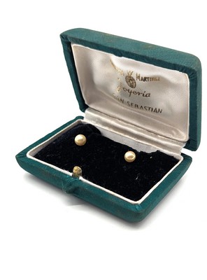 PAIRE DE BOUTONS DE MANCHETTE en argent sertis...